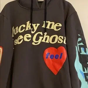 Black Hoodie “ lucky me I see ghosts” emblem on front